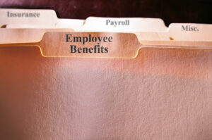 Manilla file folder labeled “Employee Benefits.”